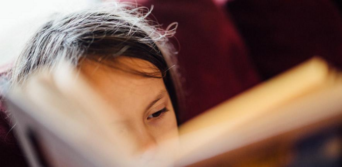 Reading for pleasure early in childhood linked to better cognitive performance and mental wellbeing in adolescence